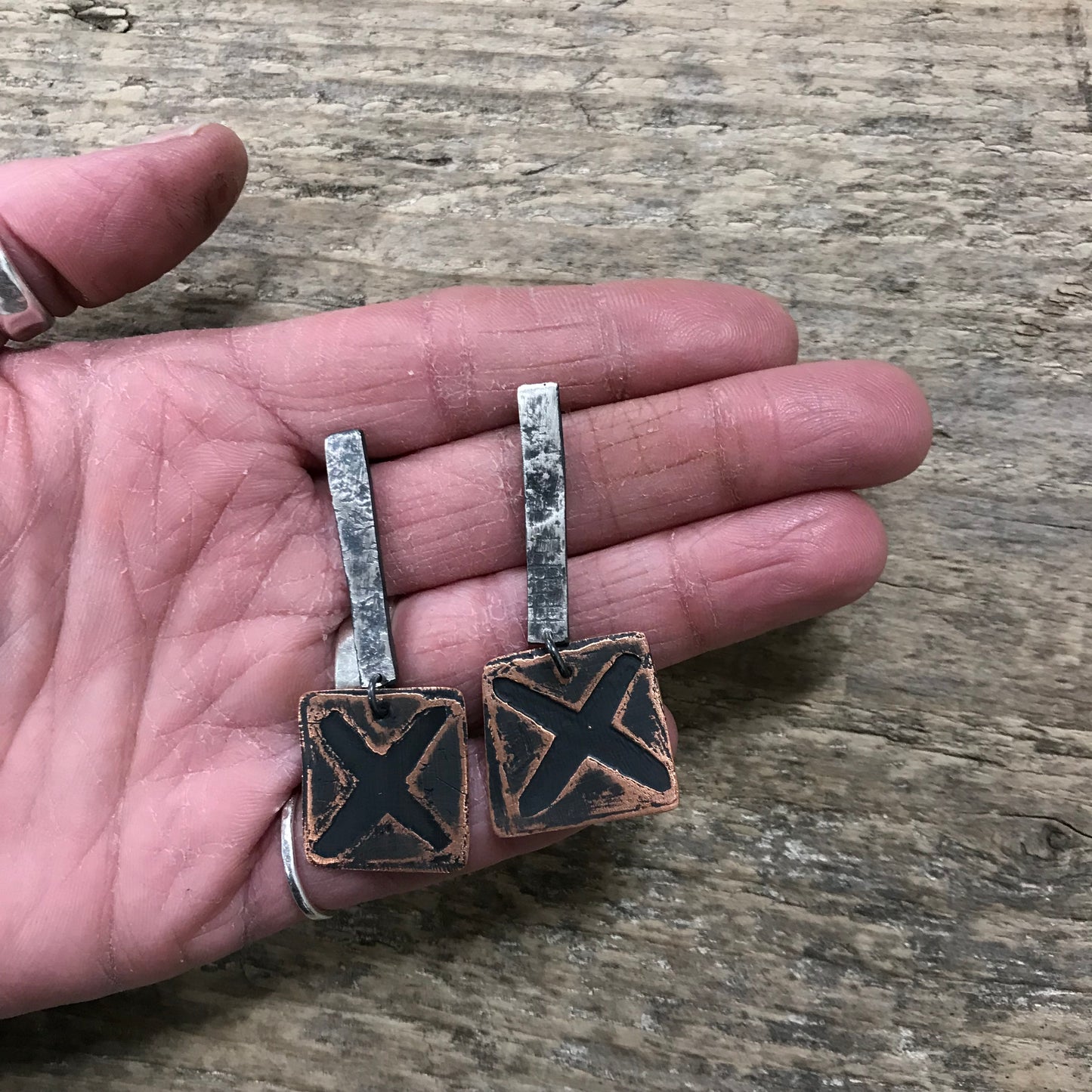etched X earrings