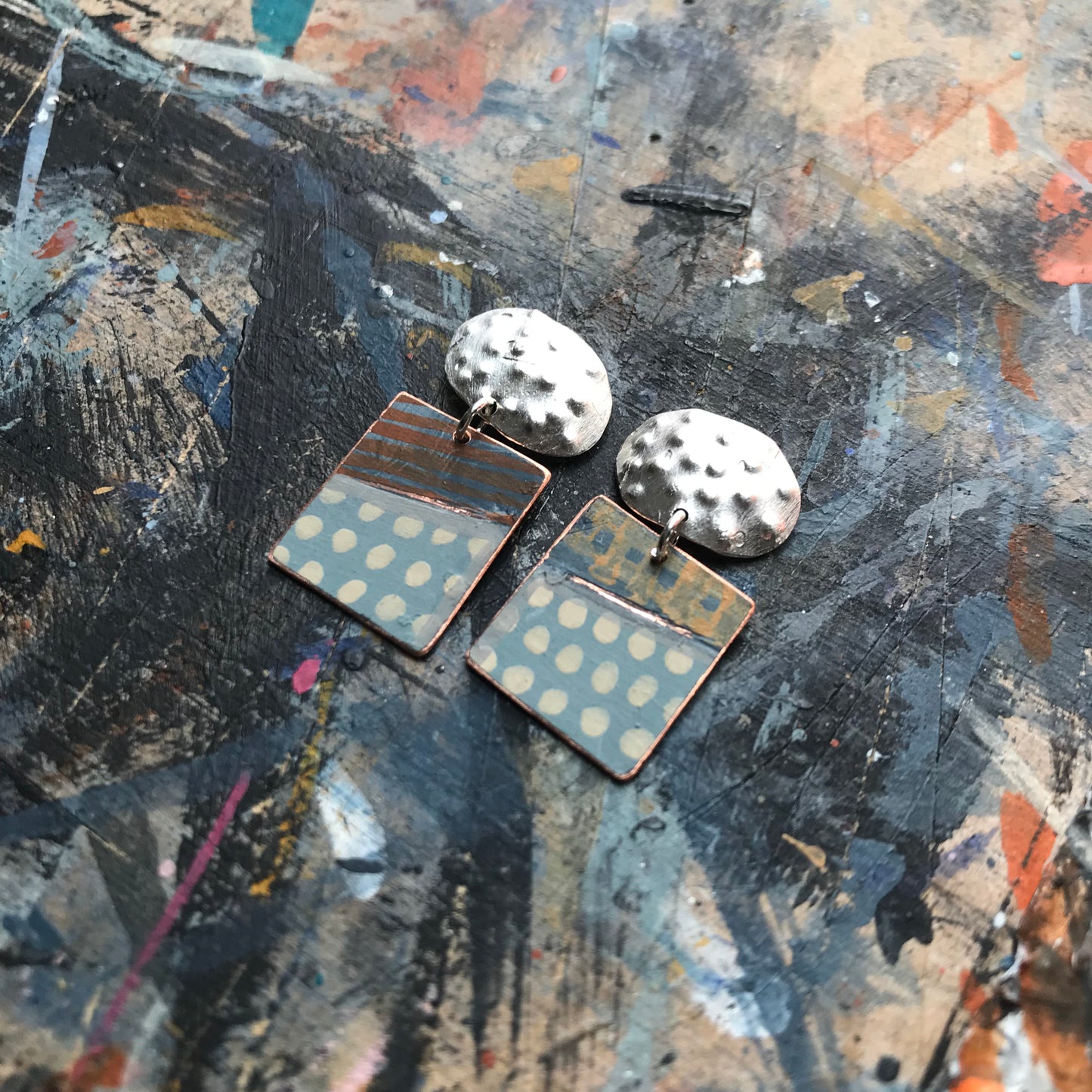 the expressive ON THE CUSP earrings with textured ovals