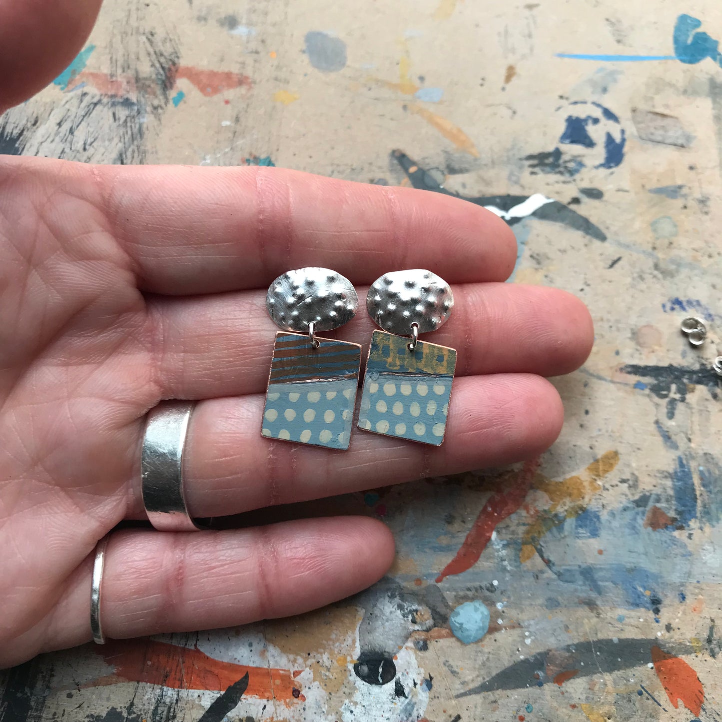 the expressive ON THE CUSP earrings with textured ovals