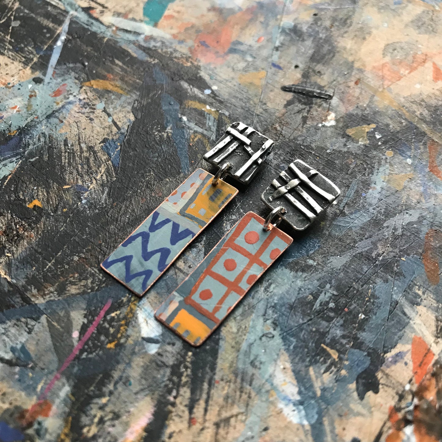the powerful dark & woven ON THE CUSP earrings
