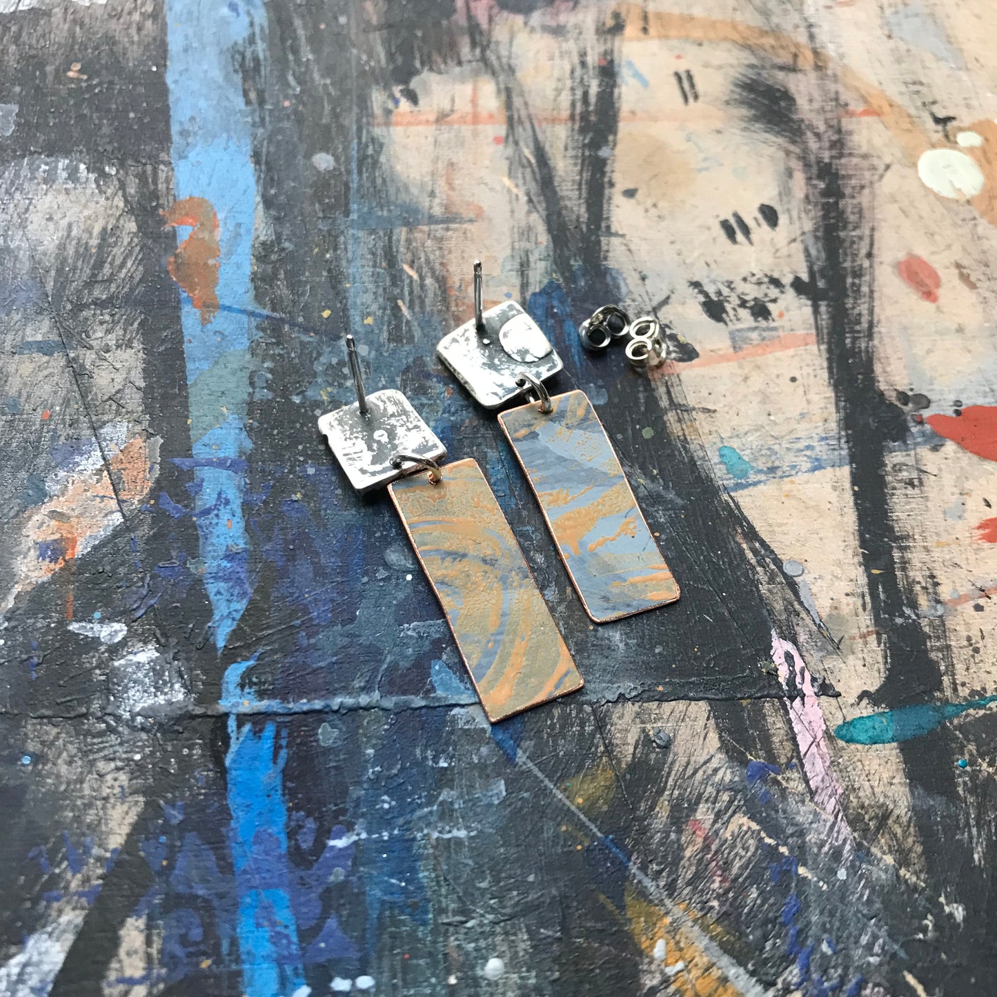 the powerful dark & woven ON THE CUSP earrings