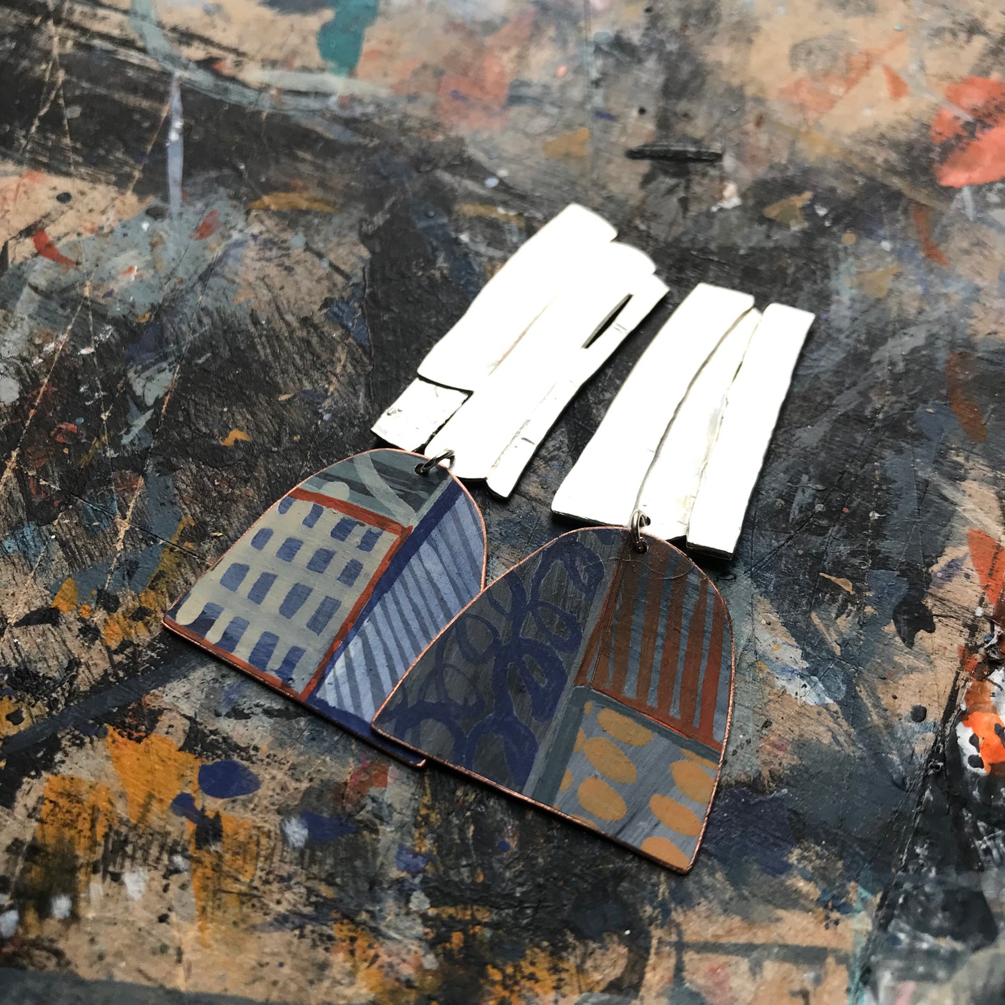the strikingly creative ON THE CUSP earrings