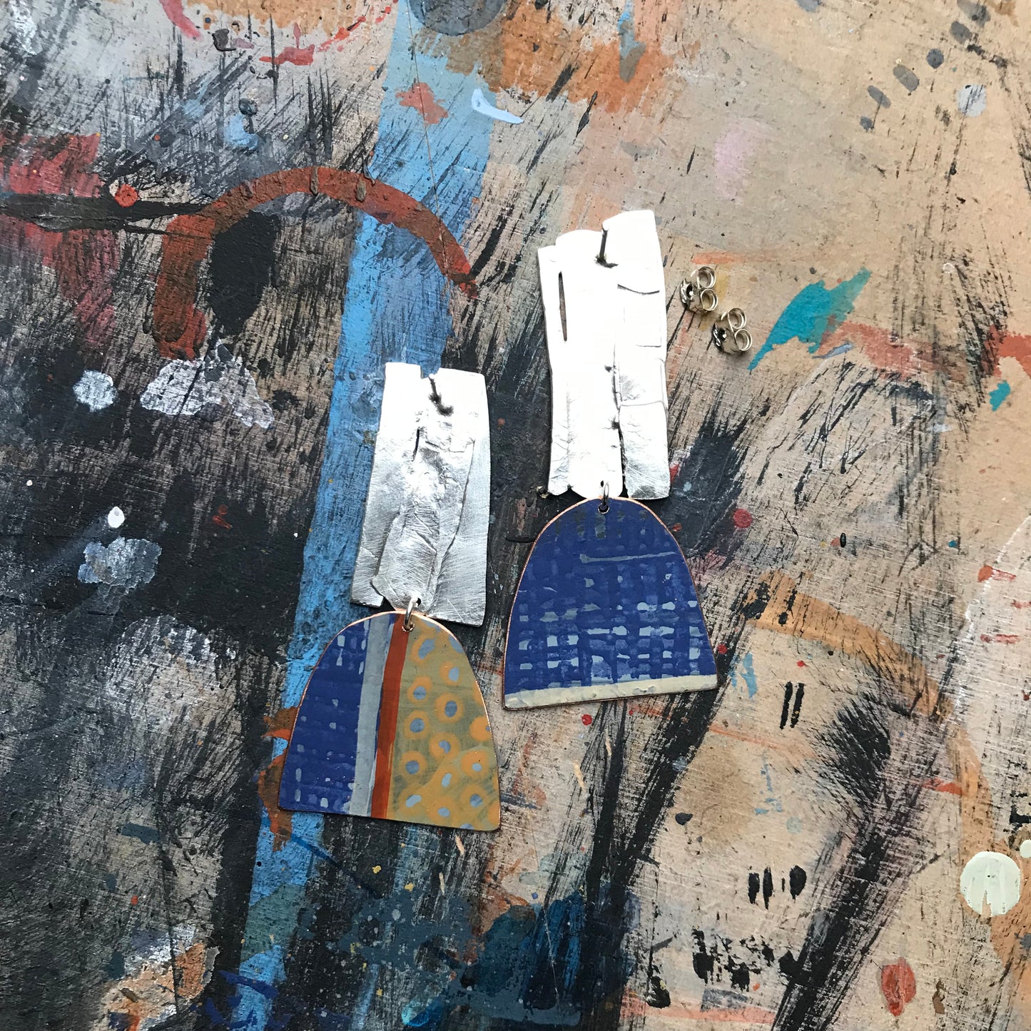the strikingly creative ON THE CUSP earrings