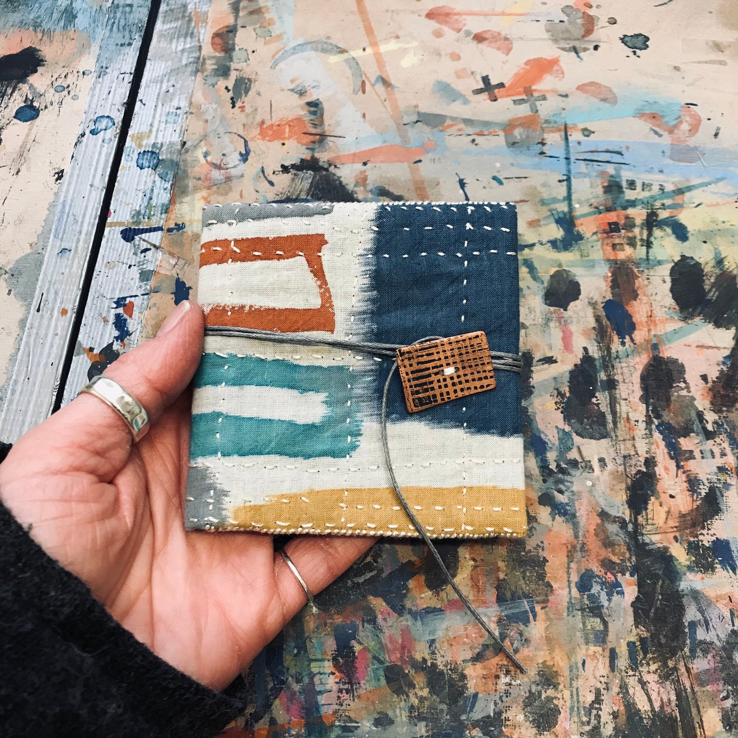 Hand stitched and painted pouch