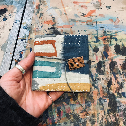 Hand stitched and painted pouch