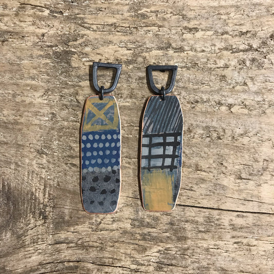 Dark playful painterly earrings with yellow X