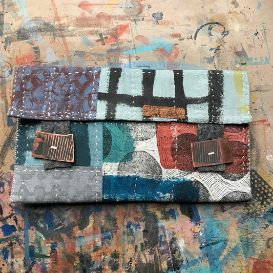 the SOFT PATCHWORK pouch with spots and grids